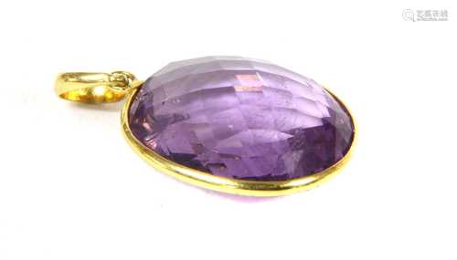 A gold amethyst pendant,