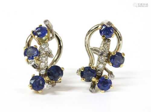 A pair of two colour gold sapphire and diamond clip earrings...