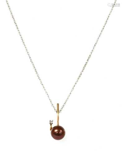 An 18ct gold cultured pearl and diamond pendant,