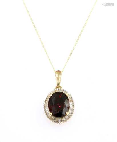 A gold garnet and diamond cluster pendant,