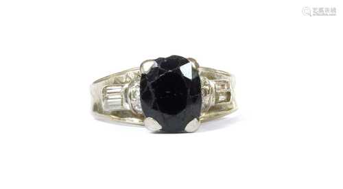 A white gold sapphire and diamond ring,