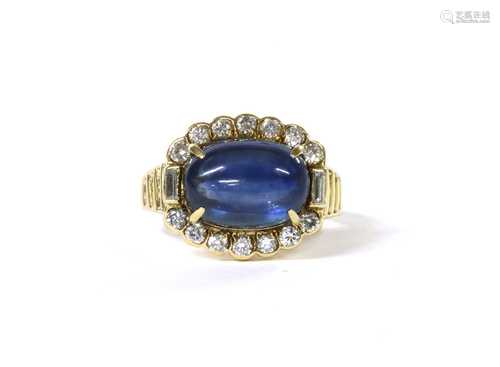 A gold sapphire and diamond cluster ring,