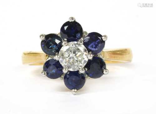 An 18ct gold diamond and sapphire cluster ring,