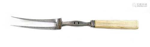 AN ENORMOUS STEEL AND IVORY CARVING FORK,