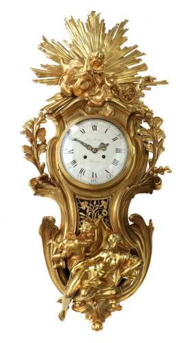 A large and impressive Louis XVI gilt-bronze cartel clock,