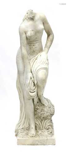 A carved marble statue of Venus of the Bath,