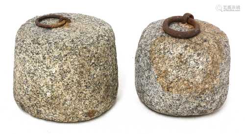 A pair of granite tethers,