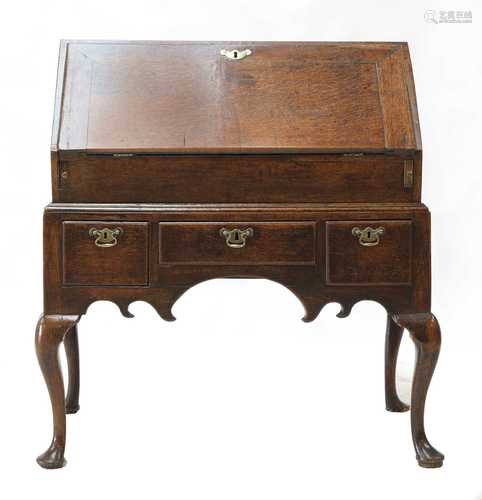 An oak bureau on stand,