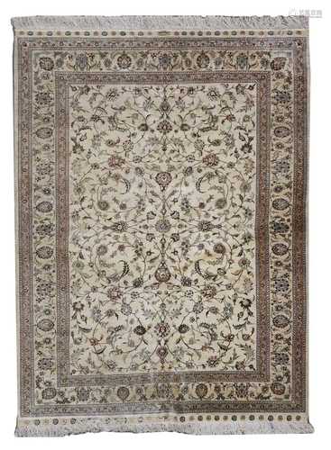 A Persian wool and silk Tabriz rug,