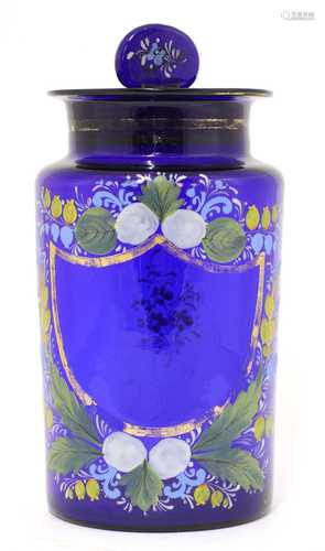 A blue glass apothecary's jar,