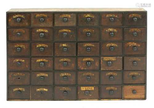 A chest of apothecary drawers,