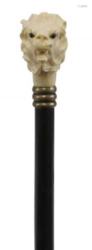 A carved ivory and ebonised walking stick,