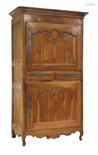 A French fruitwood cupboard,