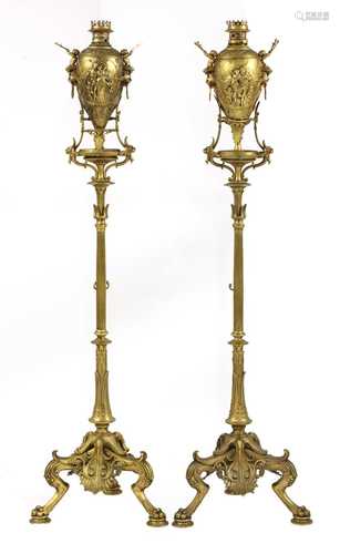 A pair of French Napoleon III Greek Revival gilt-bronze torc...