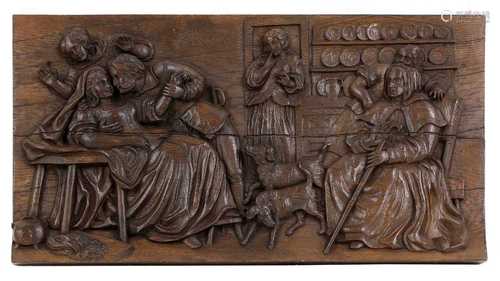 A Black Forest carved oak panel,