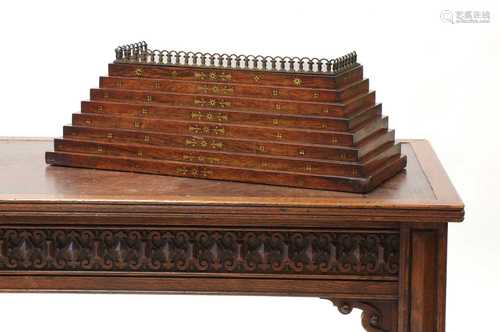 A Regency brass inlaid rosewood plinth,