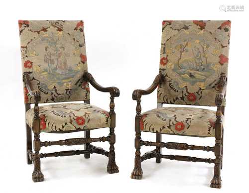 A pair of Continental stained beech armchairs