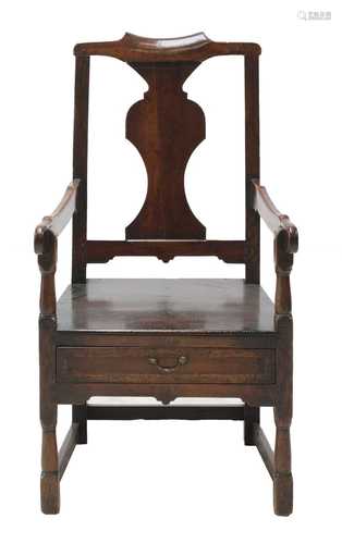 A fruitwood and oak open armchair,