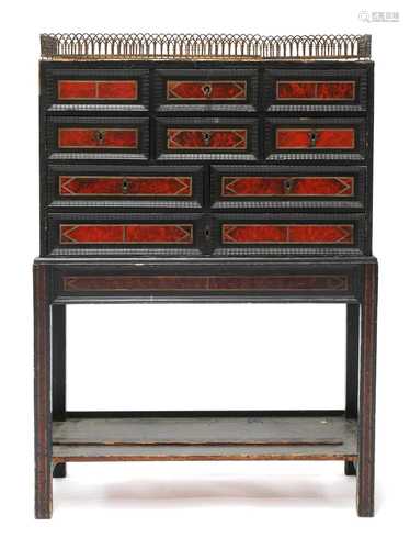 An Indo-Portuguese ebony, tortoiseshell and kingwood cabinet...