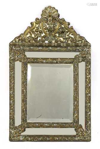 A Flemish brass mirror,