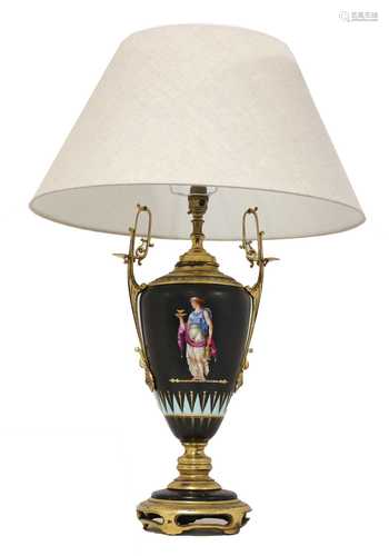 A French pottery and gilt metal table lamp and shade,