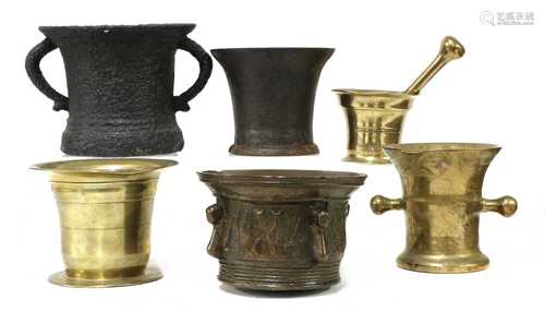 A collection of antique mortars,