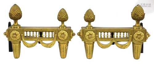 A pair of French Louis XVI-style gilt bronze chenets