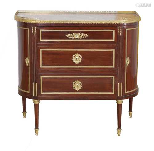 A French Louis XVI-style mahogany and ormolu mounted commode...