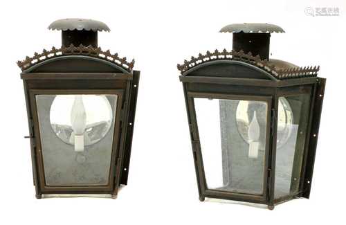 A pair of painted and pressed metal wall lights,