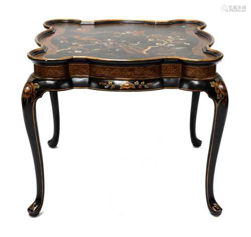 An ebonised and painted chinoiserie low table,