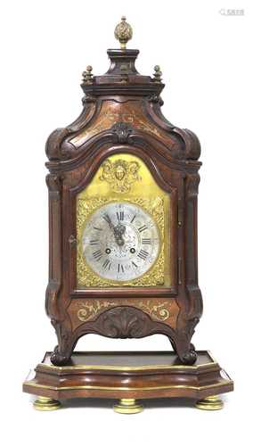 A French mahogany and brass inlaid table clock on stand