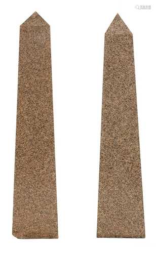 A pair of large granite obelisks,