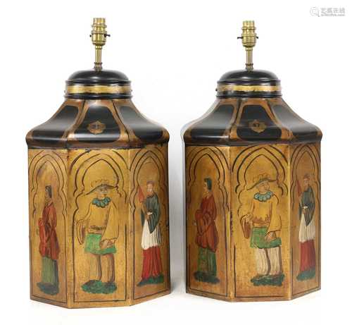 A pair of painted and gilded table lamps,