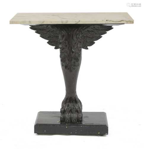 A Greek Revival carved and ebonised console table,