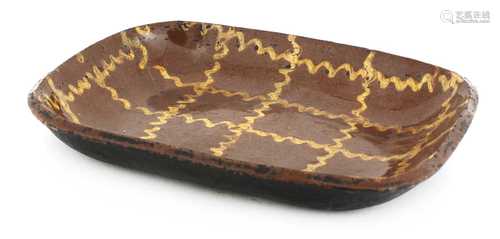 A Staffordshire pottery slipware baking dish,