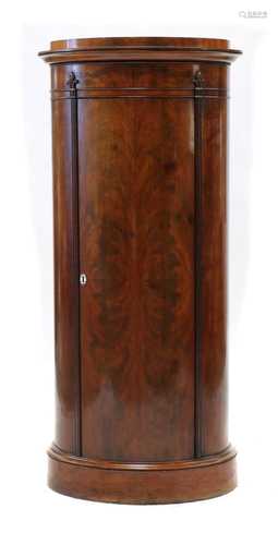 A Biedermeier mahogany pillar cupboard,