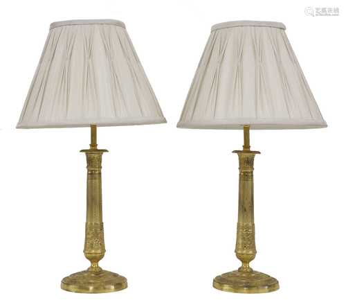 A pair of French Empire-style ormolu table lamps,