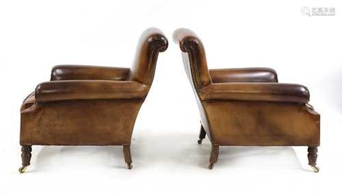 A pair of club chairs,