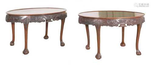 A near pair of oval mahogany silver tables,