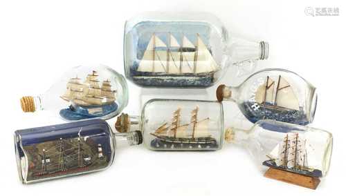 A collection of six sailorwork ships in bottles,