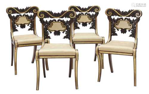 A set of four Regency rosewood and parcel-gilt single chairs...