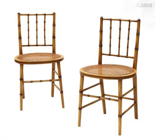 A pair of Regency-style faux bamboo side chairs,