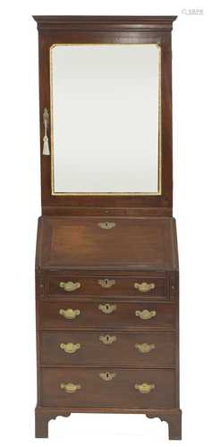 A diminutive George II-style mahogany and parcel-gilt bureau...