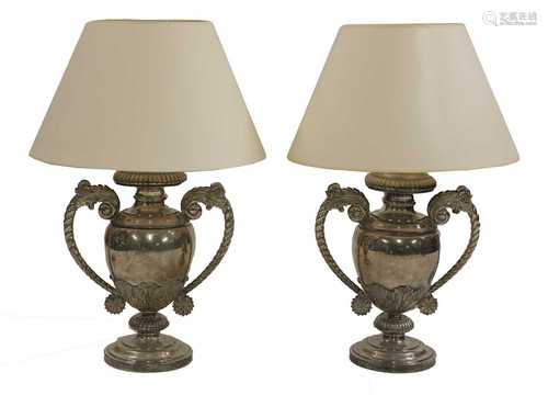 A pair of silver-plated table lamps and shades,