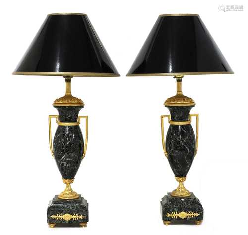 A pair of French serpentine marble urn-form table lamps