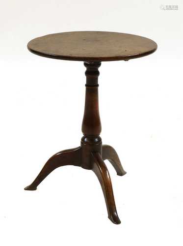 An oak tripod table,