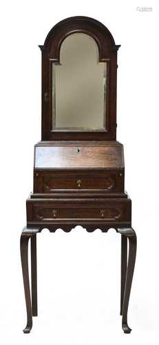 A diminutive oak dressing bureau,