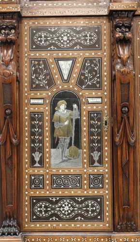 An extraordinary, profusely inlaid, mahogany cabinet,