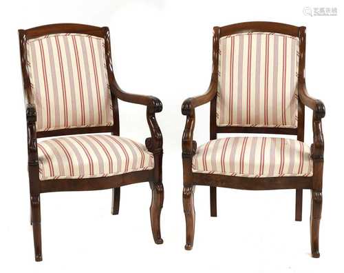 A pair of French Louis Philippe mahogany open armchairs