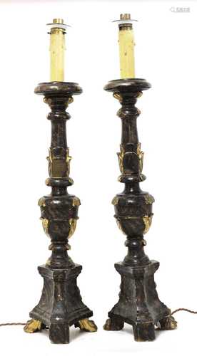 A pair of Continental giltwood and painted altar candlestick...